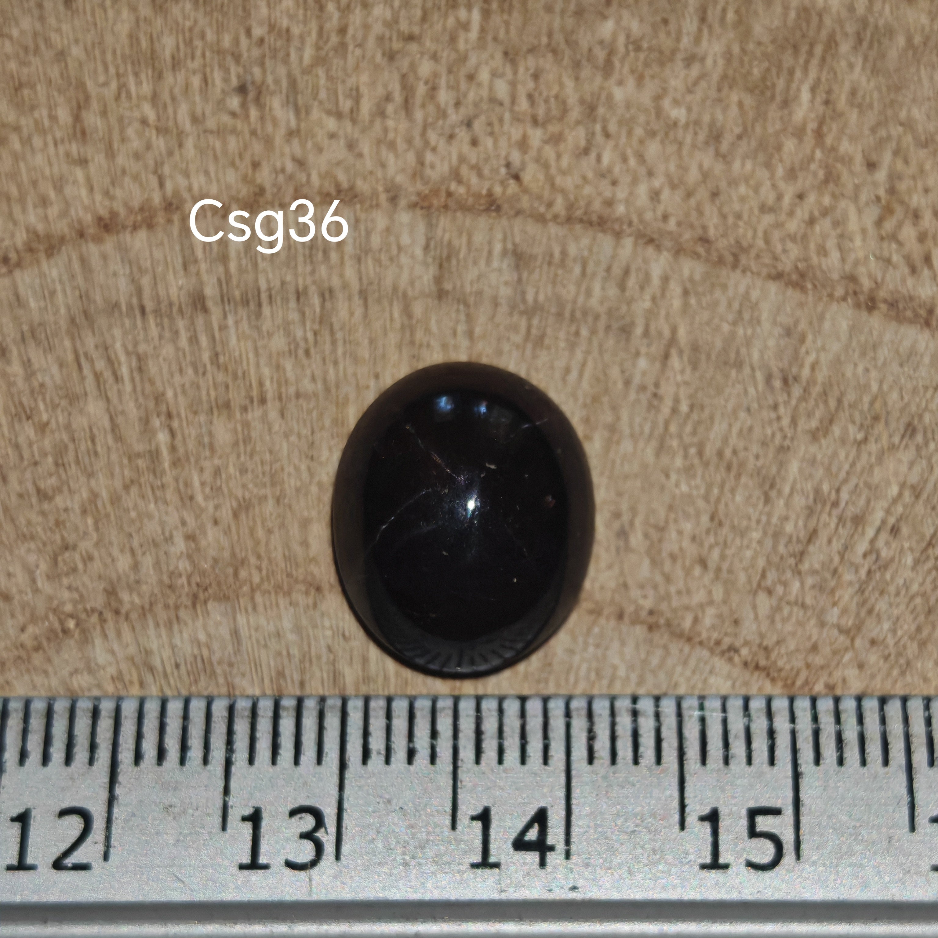 Star Garnet kabochon Csg36 – csillag gránát mérőszalaggal, méret referencia