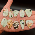 Chrome chalcedony cabochons Kk1, Kk2, Kk3, Kk4, Kk5, Kk6, Kk7, Kk8, Kk9, Kk10 – hand-held natural green chrome chalcedony gemstones

